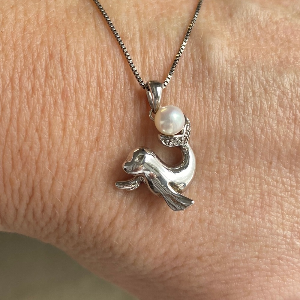 Sterling silver diamond pearl sea lion necklace